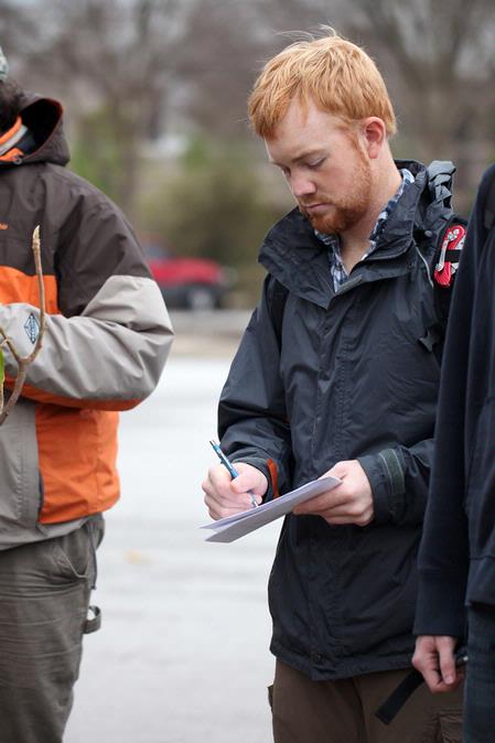 Josh Smith, senior conservation biology major, takes notes during a trip to the West TN Research & Education Center. 