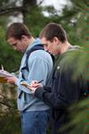 David Hamilton and Scott Hawley, junior conservation biology majors, take notes during a trip to the West TN Research & Education Center. - Photo by Kristi McMurry