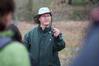 Andy Madison, associate professor of biology, shows his conservation biology students a leaf from a nearby tree during a field trip to the West TN Research & Education Center. - Photo by Kristi McMurry