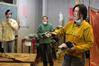 Haelim Allen, assistant professor of art, teaches her sculpture students about torch cutting and welding in class.  - Photo by Kristi McMurry