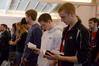 Students read along in their Bibles during chapel. - Photo by Ebbie Davis