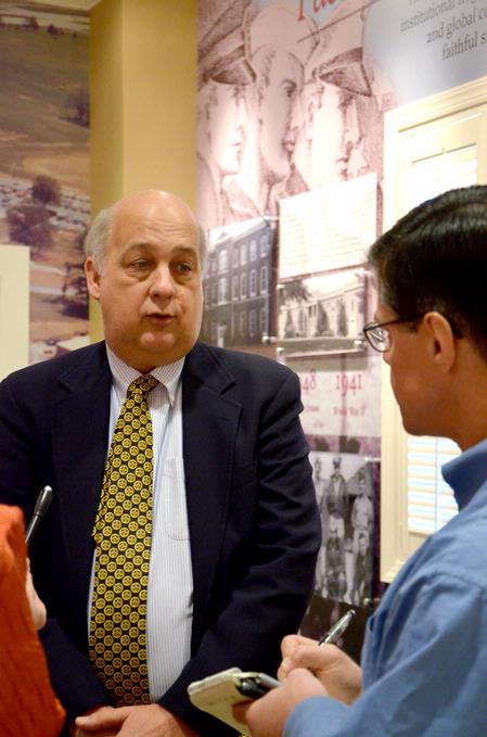 Scott Rasmussen, founder and president of Rasmussen Reports, answers questions during a small press conference before Union Forum in the Carl Grant Event Center.