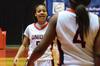 LaTesa McLaughlin strategizes with her team before the ball goes back into play during the first game of the 2011 NAIA Championship. - Photo by Beth Spain