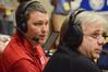 Steven Aldridge, director of sports information, commentates during the first game of the NAIA National Championship. - Photo by Beth Spain