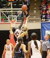 Zeinab Chan goes up against her Avila University opponent at the start of the first game of the NAIA National Championship. The Lady Bulldogs won the game 62-37 and advanced to the next round.  - Photo by Abigail Harris