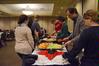 Faculty, staff, and students enjoy the line of hor d'oeuvers provided by Aramark at the "Hoping to Live Forever" lectures in the Carl Grant Center. - Photo by Abigail Harris