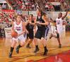 Kayla Hudson drives past Avila University's defense to go for a lay-up in game one of the NAIA National Championship.  - Photo by Morris Abernathy