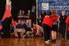 Katie Woodruff, assistant coach, takes LaTesa McLaughlin's mother out to check on her daughter after an injury in game two of the NAIA National Championship. - Photo by Morris Abernathy