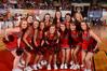 The Union University cheerleaders take a second to pose after the Lady Bulldogs won game two of the NAIA National Championship. - Photo by Morris Abernathy