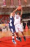 Lavanda Ross goes up for a shot against her Shawnee State University opponent. - Photo by Morris Abernathy