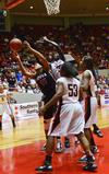 Zeinab Chan struggles to rebound the ball in the second half of the NAIA championship game. - Photo by Beth Spain
