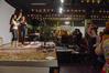 Students lead a dancing lesson during the Culture Fest open mic night in Barefoots Joe.  - Photo by Abigail Harris