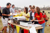 Members of Chi Omega serve barbeque to parents during Family Weekend 2003. - Photo by Kristen Nicole Sayres