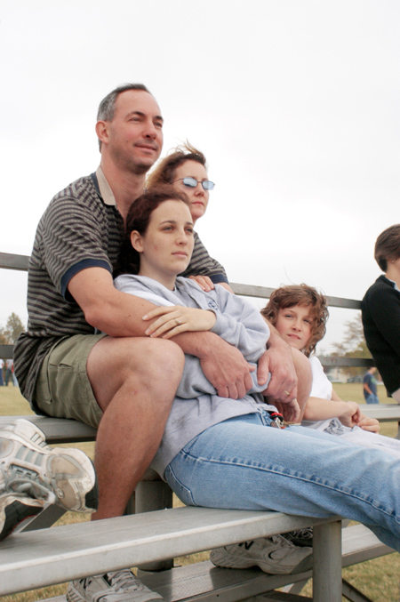 Freshman Chelsea Mytyk enjoys the company of her parents during Family Weekend 2003.