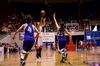 Kayla Hudson shoots a 3-pointer while being strongly defended. Union Lady Bulldogs play Olivet Nazarene in the second round of the 2011 NAIA Division I Women's Basketball National Championship. Union won 81 to 69.  - Photo by Ebbie Davis