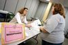 Junior Jolene Shank visits the Welfare Office during a Life in the State of Poverty Simulation hosted by Union's social work program. - Photo by Justin Veneman