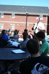 Brad Green, associate professor of Christian thought and tradition, teaches his class on the Barefoots Joe patio on a beautiful day. - Photo by Deanna Santangelo
