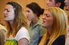Students worship through song during chapel. - Photo by Beth Spain