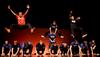 The men of Alpha Tau Omega perform high jumping stunts while performing in the 14th annual Variety Show. - Photo by Ebbie Davis