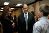 Tony and Lauren Dungy, super bowl winning coach and his wife, greet Michael Elliott, son of Kelly Elliott, during the Roy L. White Legacy Golf and Gala. - Photo by Deanna Santangelo