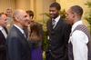 Tony Dungy, Super Bowl winning coach, greets Antoine Hall and Skyler Vaden during the Roy L. White Golf and Gala.  - Photo by Beth Spain