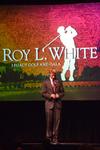 Karl Magnuson, junior SGA president, gives the opening prayer at the Roy L. White Golf and Gala. - Photo by Beth Spain