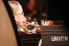 Symphonic Band member Katie Stephens plays the trumpet at <i>A Union Christmas: A Ceremony of Carols</i>. - Photo by Lindsay Stavish