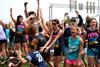 The women of Zeta Tau Alpha cheer for their sisters who just won the rope pull competition at Greek Olympics. - Photo by Deanna Santangelo