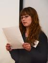 Whitney Williams, junior Christian studies major, presents her group's creative end to The Mystery of Edwin Drood, a Dickens' novel, for the Union University Scholarship Symposium.  - Photo by Victoria Stargel