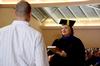 Carla Sanderson, provost and executive vice president, presents the Broadman and Holman Award to Hunter Bragg, senior history major, during Awards Day chapel. - Photo by Deanna Santangelo