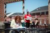 Students enjoy some study time on the patio of Barefoots Joe.  - Photo by Kristi McMurry