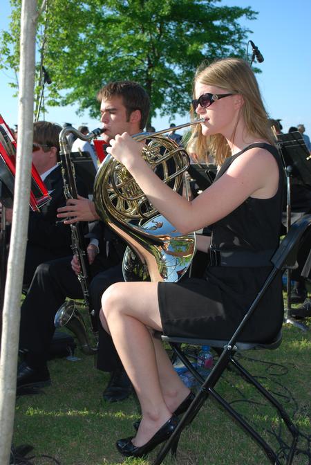 Rebecca Henderson, sophomore music education major, performs during spring graduation on the Great Lawn.