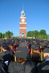Students fill the seats during the spring graduation on the Great Lawn. - Photo by Jacob Moore