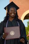 Jacqueline Carruthers receives her nursing degree during spring graduation. - Photo by Victoria Stargel