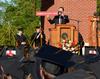 Gary Carter, senior vice president for business services, presents the road sign for the newly named Lanese Dockery Drive at Union University's spring graduation. - Photo by Victoria Stargel