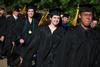 Rebecca Eaton, mathematics graduate, walks to the Great Lawn for spring graduation.  - Photo by Kristi McMurry