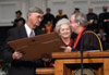 President David S. Dockery presents the Robert E. Craig Service Award to Dr. Hoyt Wilson (pictured with his wife Nancy) at Fall Graduation 2003. - Photo by Jim Veneman