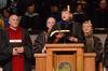 Carla Sanderson, provost and executive vice president, reads from Isaiah 55 during Union's summer graduation ceremony. - Photo by Beth Spain