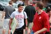 Clovis Simas, soccer coach, and Justin Barnard, associate professor of philosophy, laugh together while helping with New Student Move-in.  - Photo by Kristi McMurry