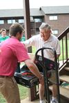 John Dawson, senior social work major, and Giley Wright, chemistry stockroom coordinator, help move items into dorms for New Student Move-in. - Photo by Deanna Santangelo