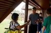 Paul Jackson, professor of Biblical studies, introduces himself to Kevin Luy, freshman biology/pre-med major, and his mother during New Student Move-in.  - Photo by Ebbie Davis