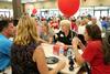 Kathy Southall (center), director of intercessory prayer and encouragement, has dinner with incoming students and their families during the freshmen picnic in the Brewer Dining Hall. - Photo by Deanna Santangelo