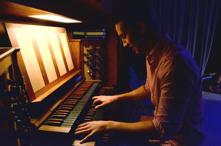 Sam Ritter, senior music major, plays the organ for a skit performed at the annual Focus Show.