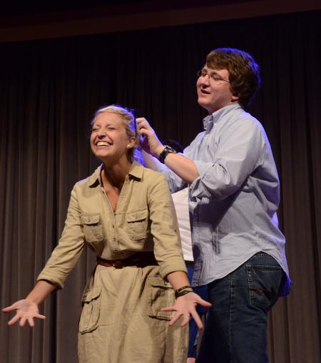 Focus leaders, Mazie Walthall and Lucus Littleton act out motions to the song "Butterfly Kisses" at the annual Focus Show.
