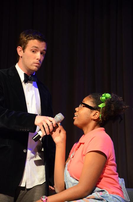 Andy Seaton, senior Christian studies major, and Mandisa Wofford, senior economics major, perform a skit at the annual Focus Show. 