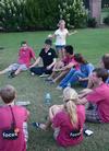 Greg Thornbury, dean of the school of theology and missions, and his daughter join new students in a game of "duck, duck, goose" during the annual ice cream social. - Photo by Jacob Moore