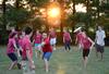 New students enjoy a game of Frisbee during the annual ice cream social outside the home of David and Lanese Dockery. - Photo by Jacob Moore