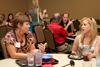 Julie Powell, associate professor of sport management, talks with Casie Logan, freshman pews major, during Dinner with your Department in the Carl Grant Event Center. - Photo by Deanna Santangelo