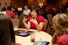 Ashley Blair, assistant professor of communication arts, talks with new students during Dinner with your Department in the Carl Grant Event Center. - Photo by Deanna Santangelo