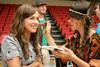 Chelsea Meiss, freshman sociology and intercultural studies major, has her face painted by Ellen Cline, sophomore art major, during the LifeGroup presentations for new students. - Photo by Deanna Santangelo